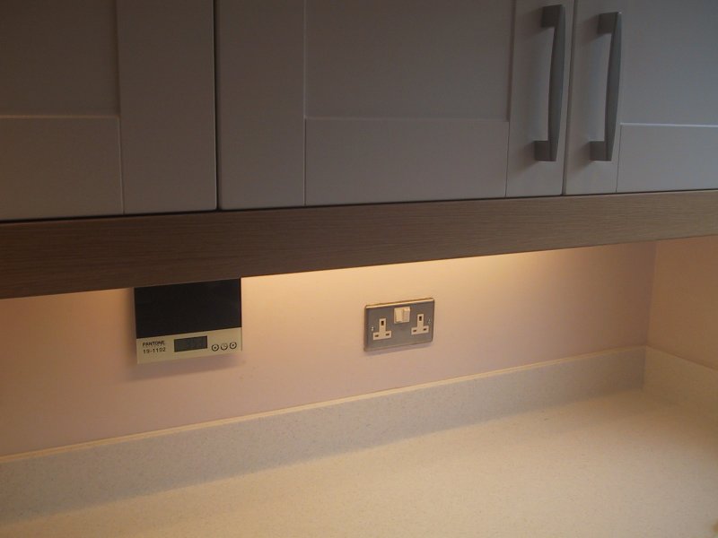 Under cupboard kitchen lighting using miniature fluorescent strip lights