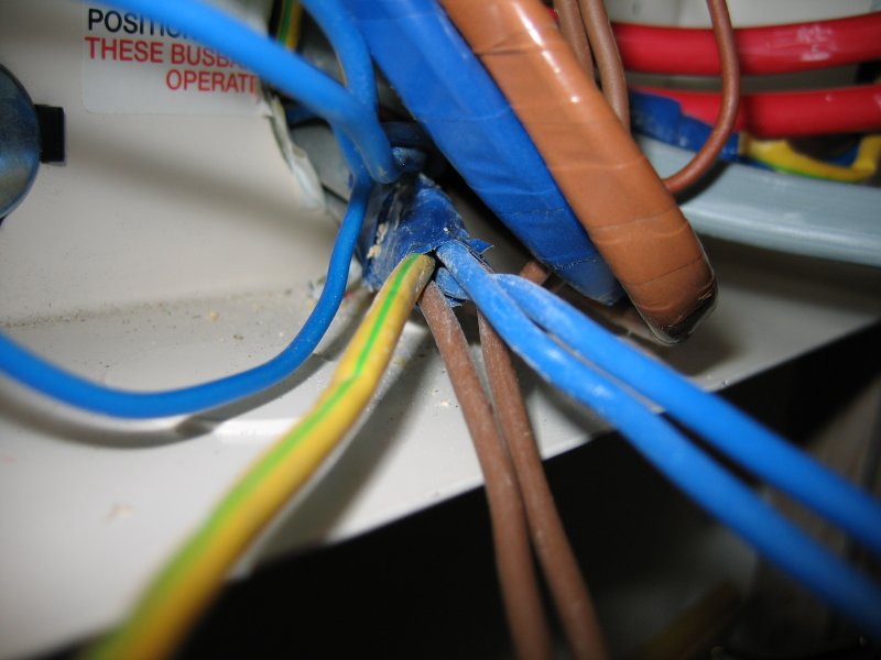 Inside the Consumer Unit, he doubled up the cores for L and N, wrapping them in coloured tape