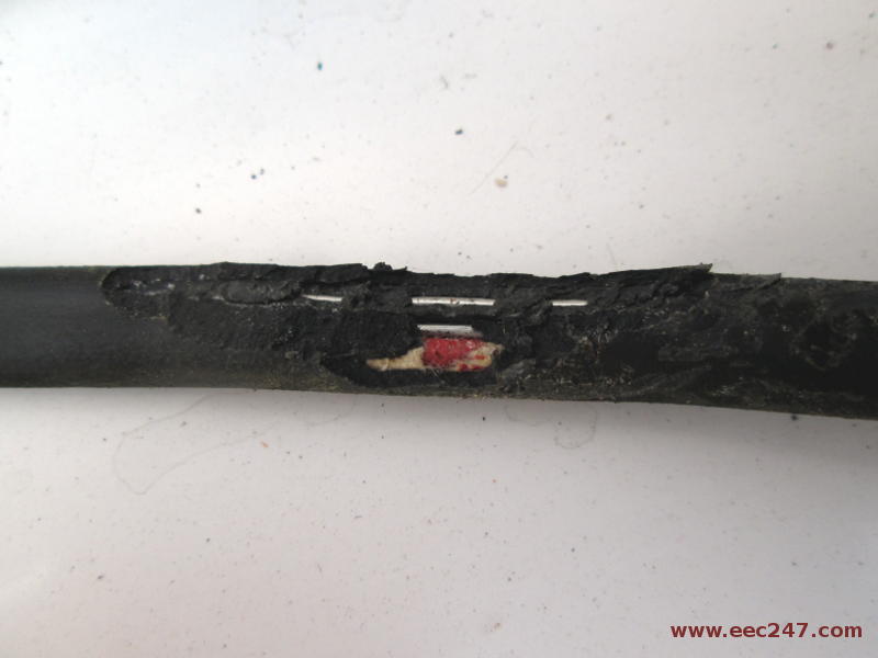 picture of perished rubber covered electrical cable with rodent (rat or large mouse) damage