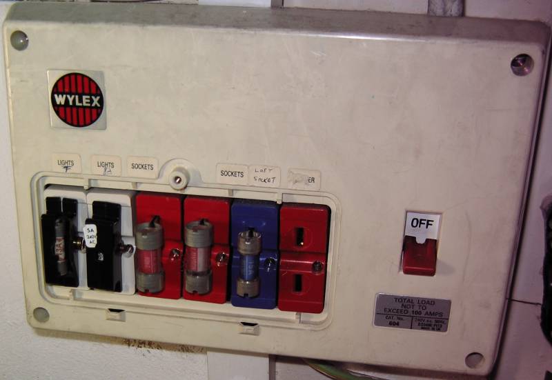 Fusebox found with broken fuse carriers and exposed live parts