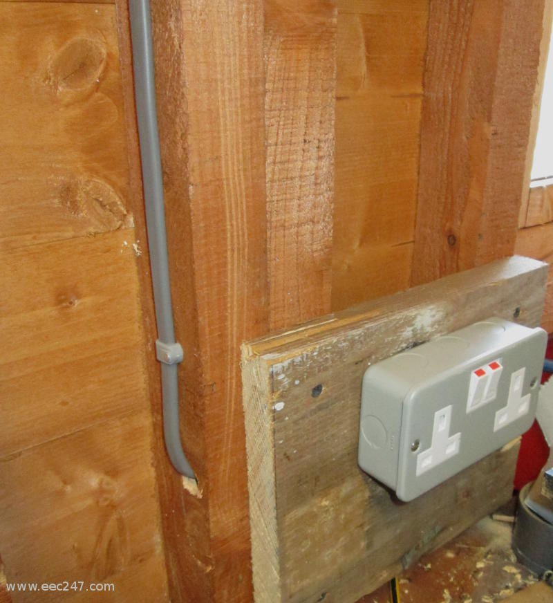 Sockets in a shed with surface clipped cables