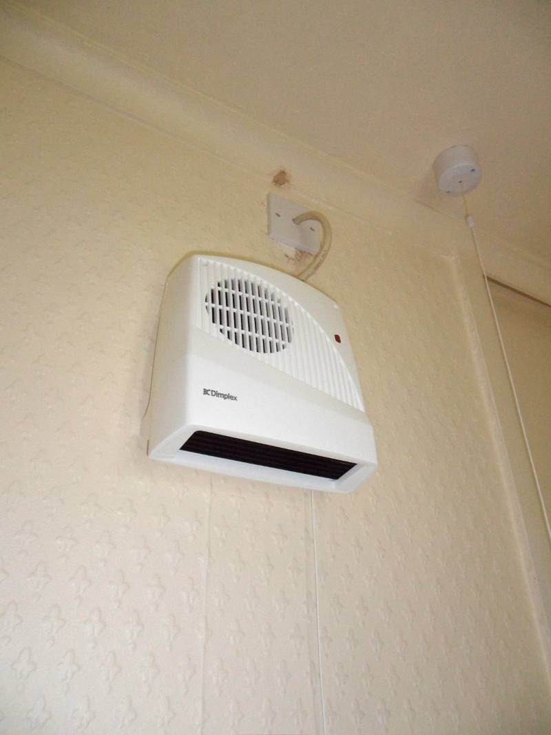 A fan heater suitable for the bathroom
