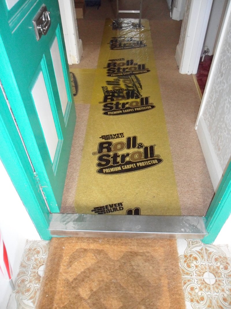 Carpet protector laid in hallway before work starts